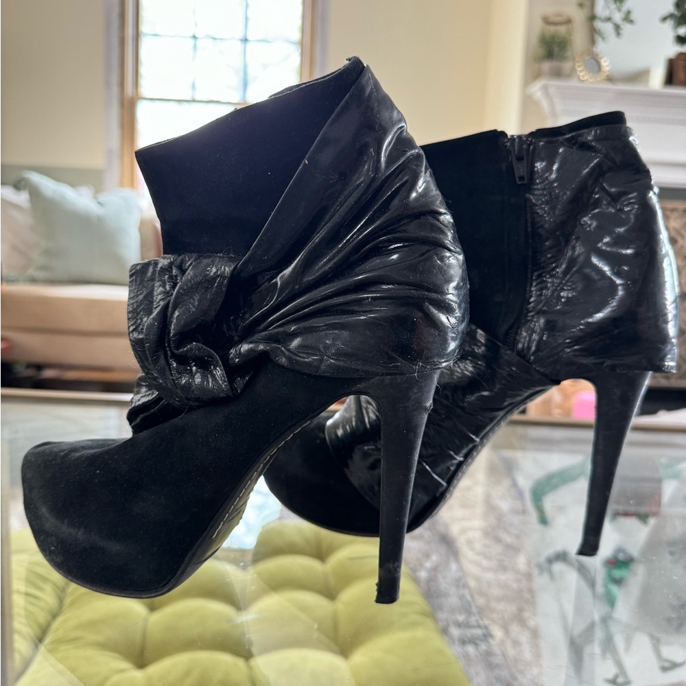 RODO Runway-Worn Black Suede Heels with patent leather wrap around bow.